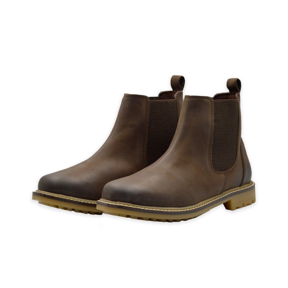 Cut-out photo showing a two-thirds view of the Walker & Hawkes Ambleside leather boots in tan brown.