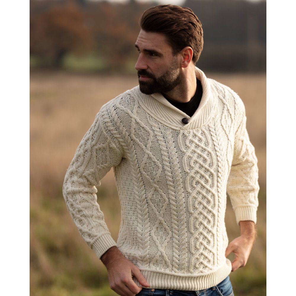 Male model wearing the Walker & Hawkes supersoft Merino wool Darlaston jumper in pearl.