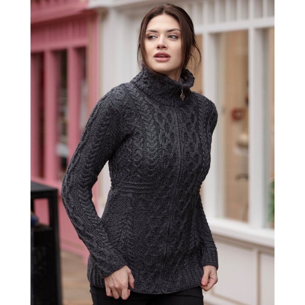 Female model wearing the Walker & Hawkes Donna jumper in iron grey.