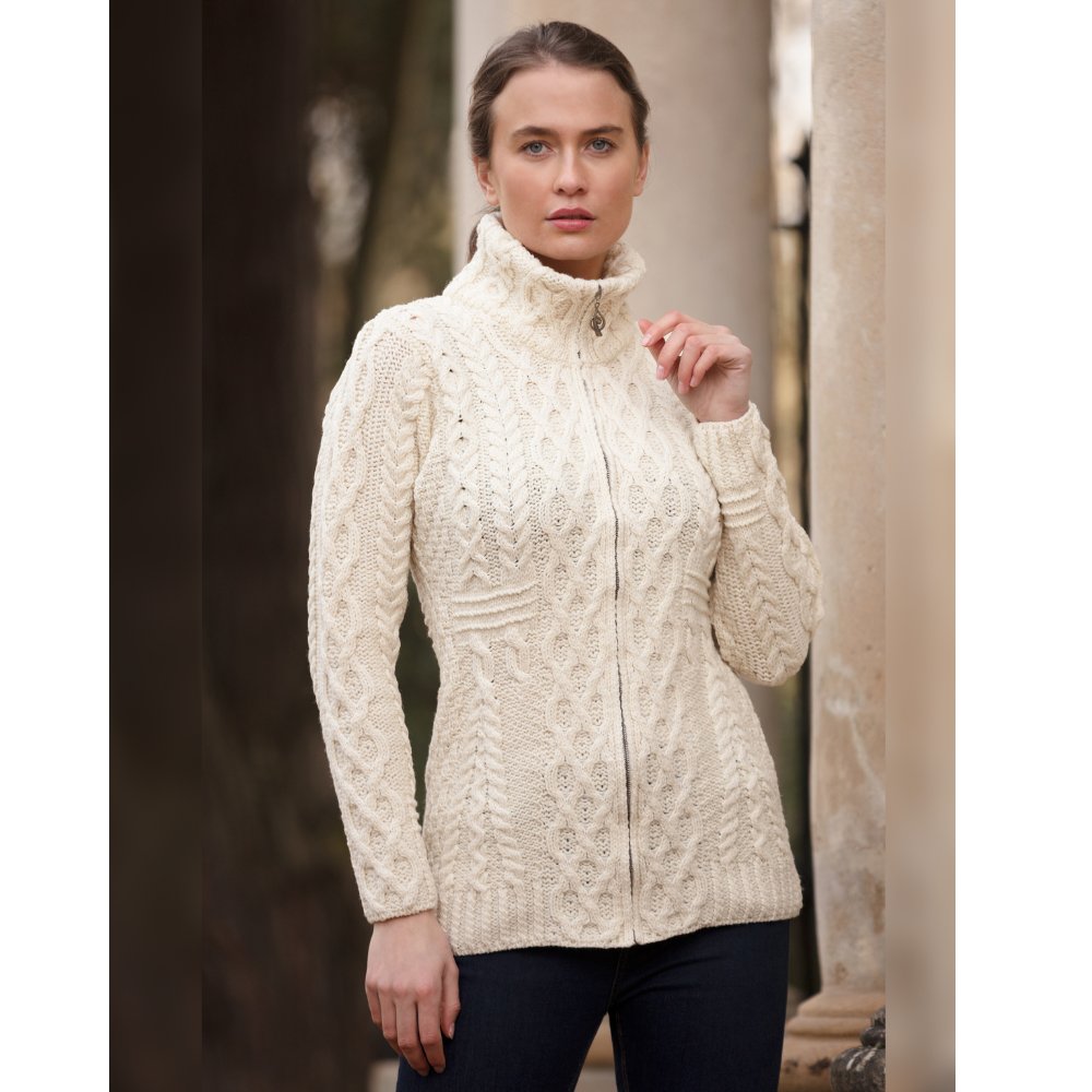 Female model wearing the Walker & Hawkes Donna jumper in pearl.