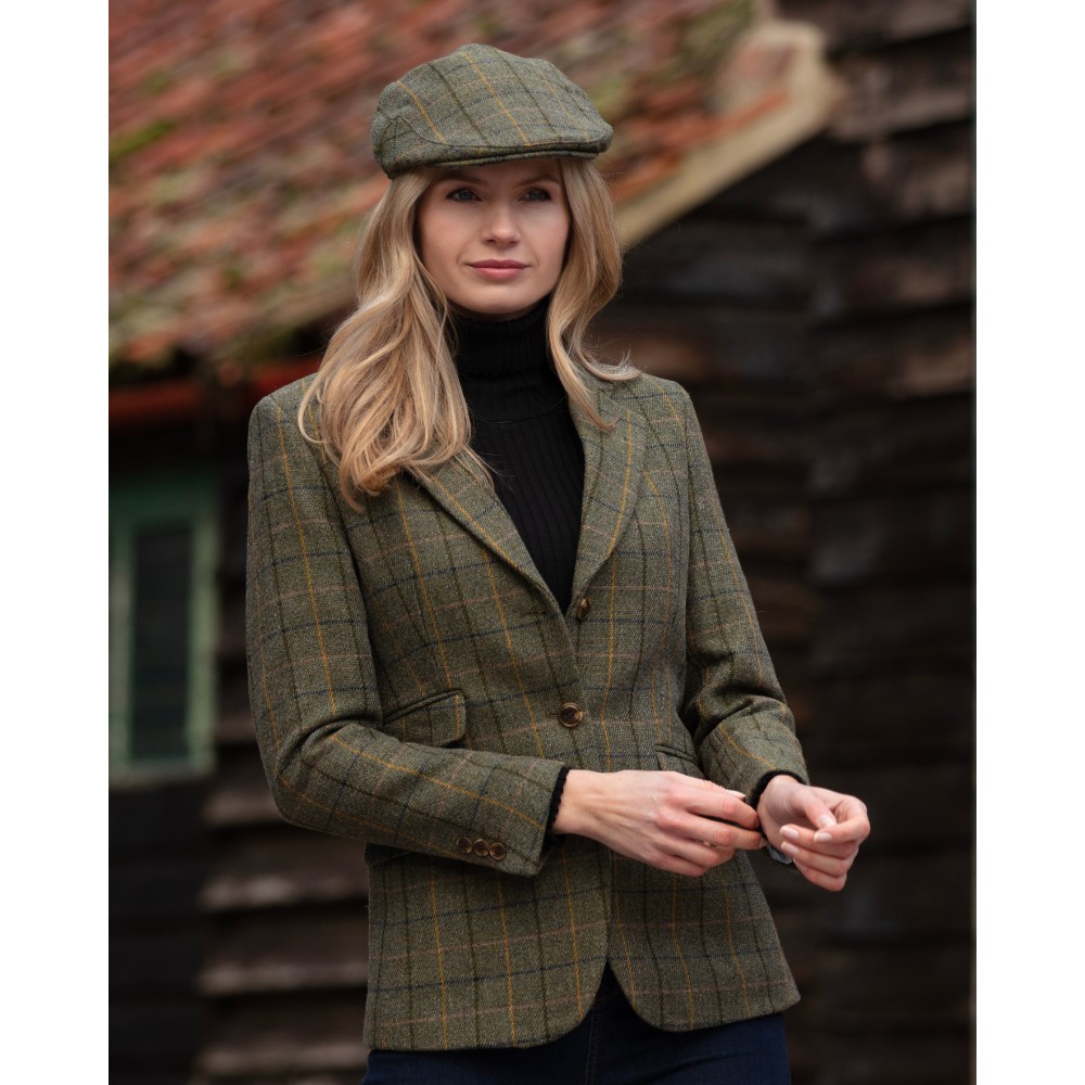 Female model wearing a Walker& Hawkes Ladies Derby Tweed Mayland Blazer with navy stripe.