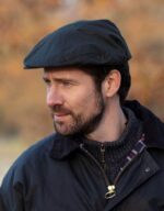 belton-flat-cap-navy-model.jpg