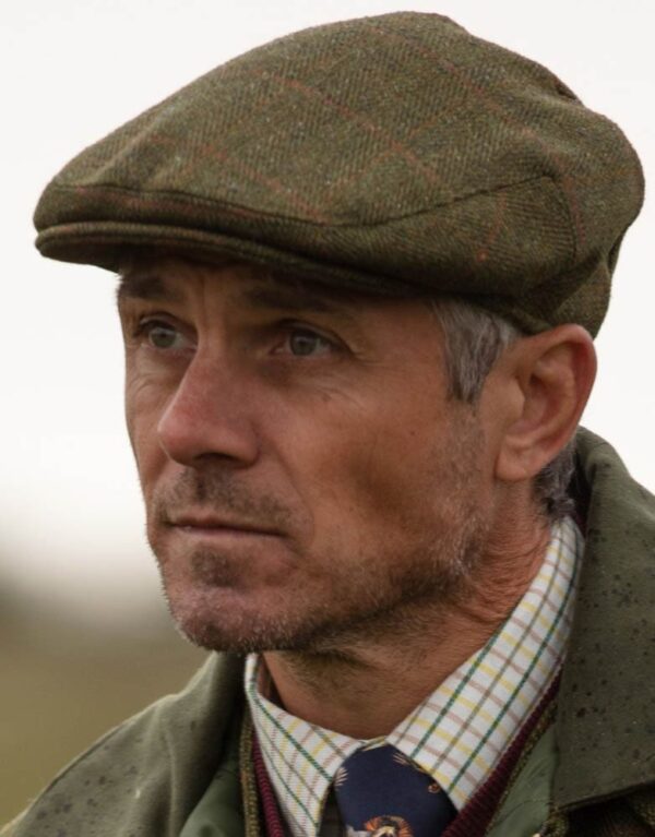 cambridge-flat-cap-dark-sage-model.jpg