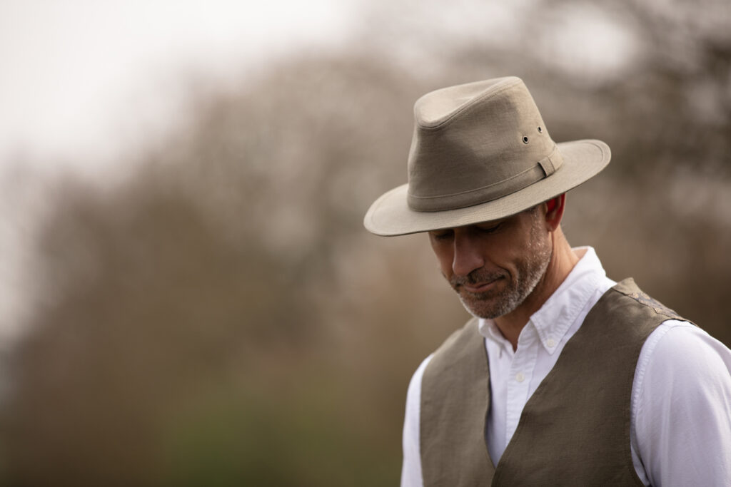 Man wearing the Gleno Safari hat from Walker & Hawkes.