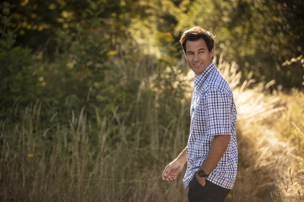 Man wearing the Canterbury shirt from Walker & Hawkes.